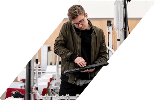 An engineer typing on a keyboard