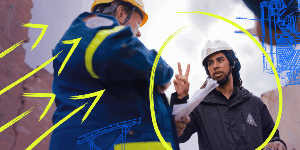 Director of engineering giving direction to another engineer.
