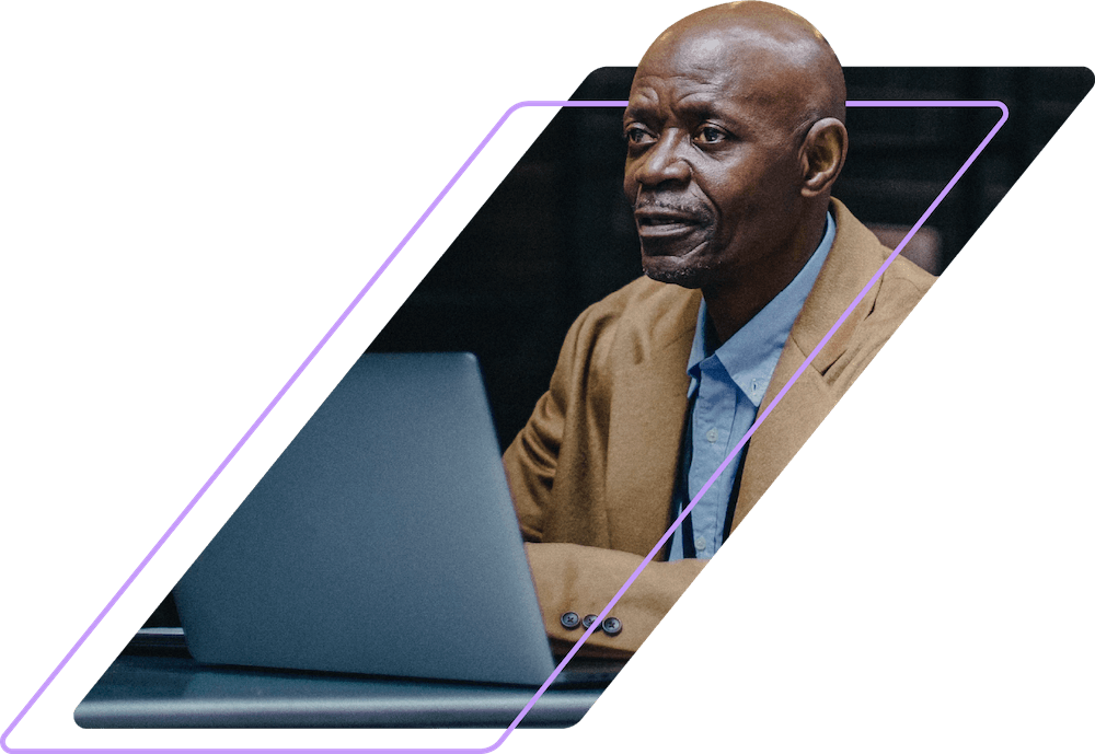 A C-level executive working on his laptop