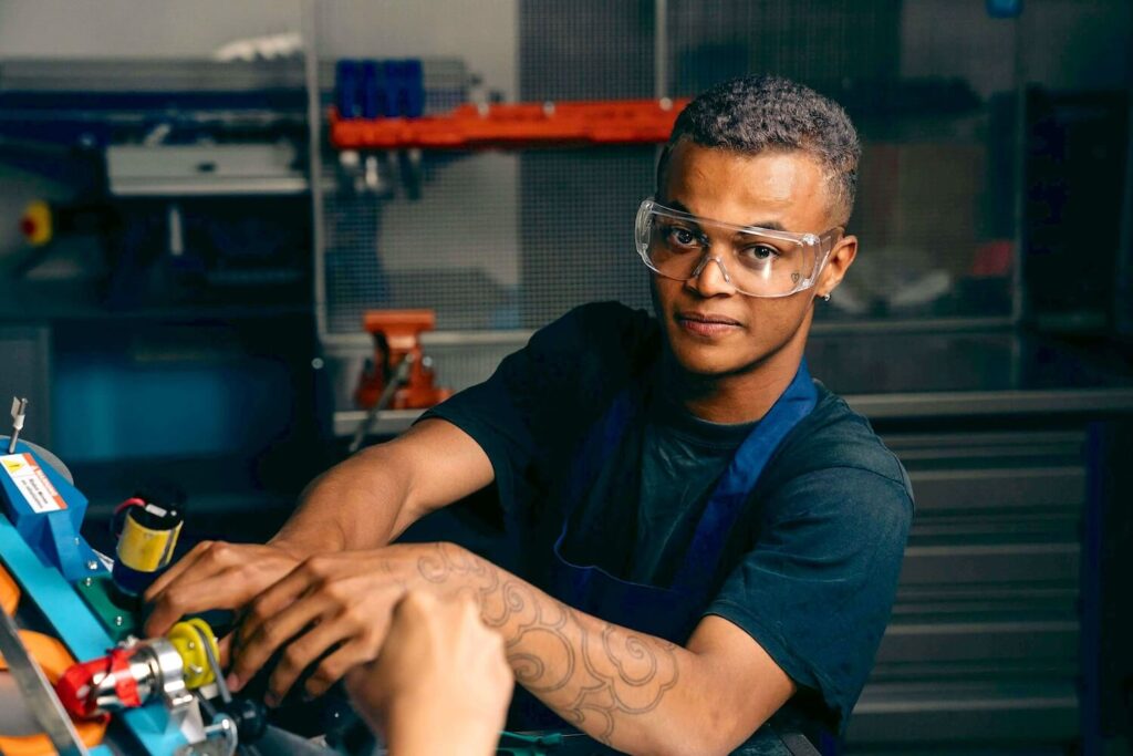 A worker gaining manufacturing experience.