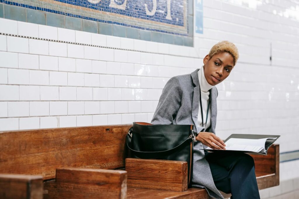 A woman wondering, "why use a staffing agency?"