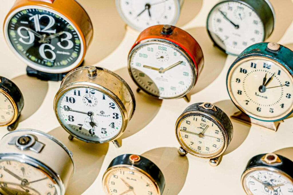 A variety of clocks representing "what is a 9/80 work schedule?"