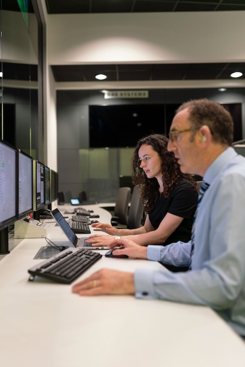Engineers working in a control room